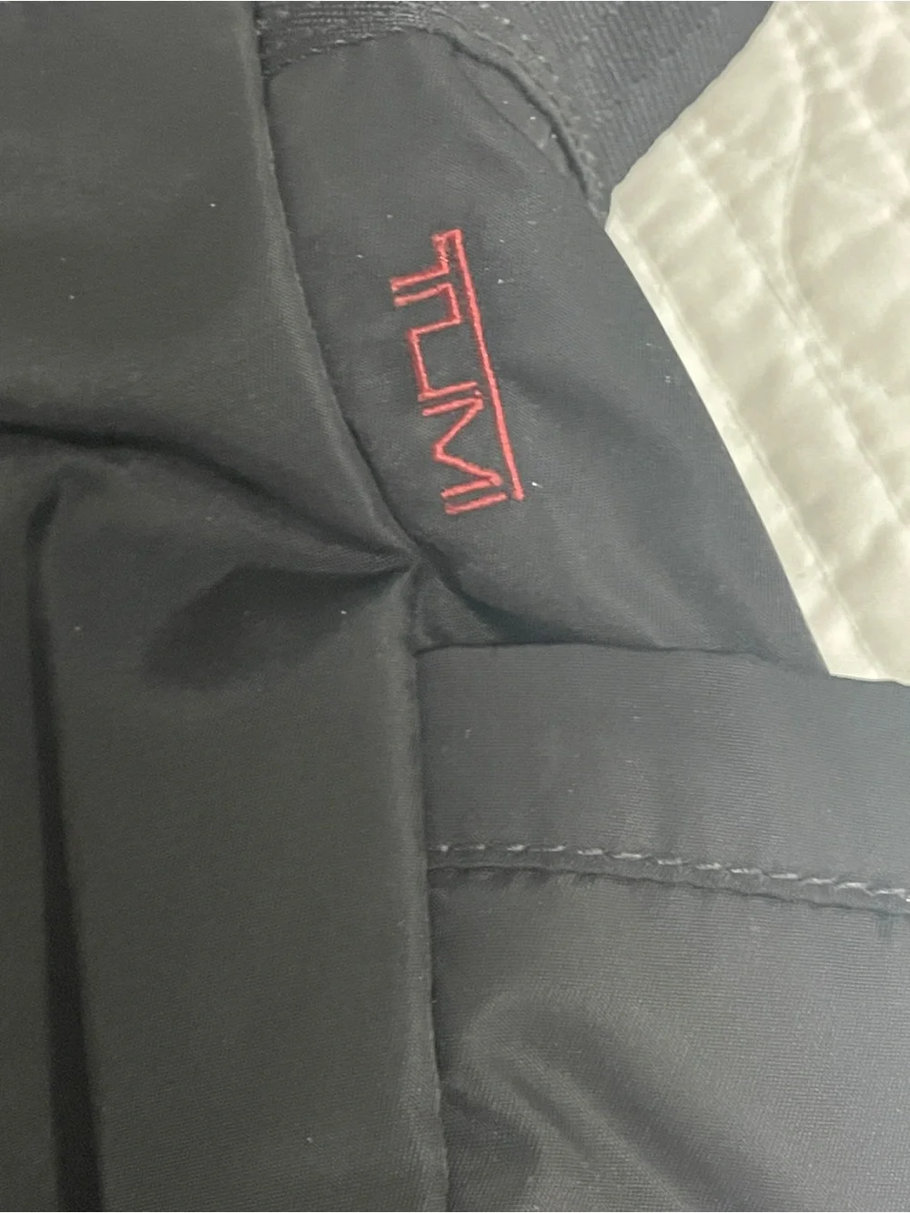 Tumi Black Messenger Bag with Red Interior